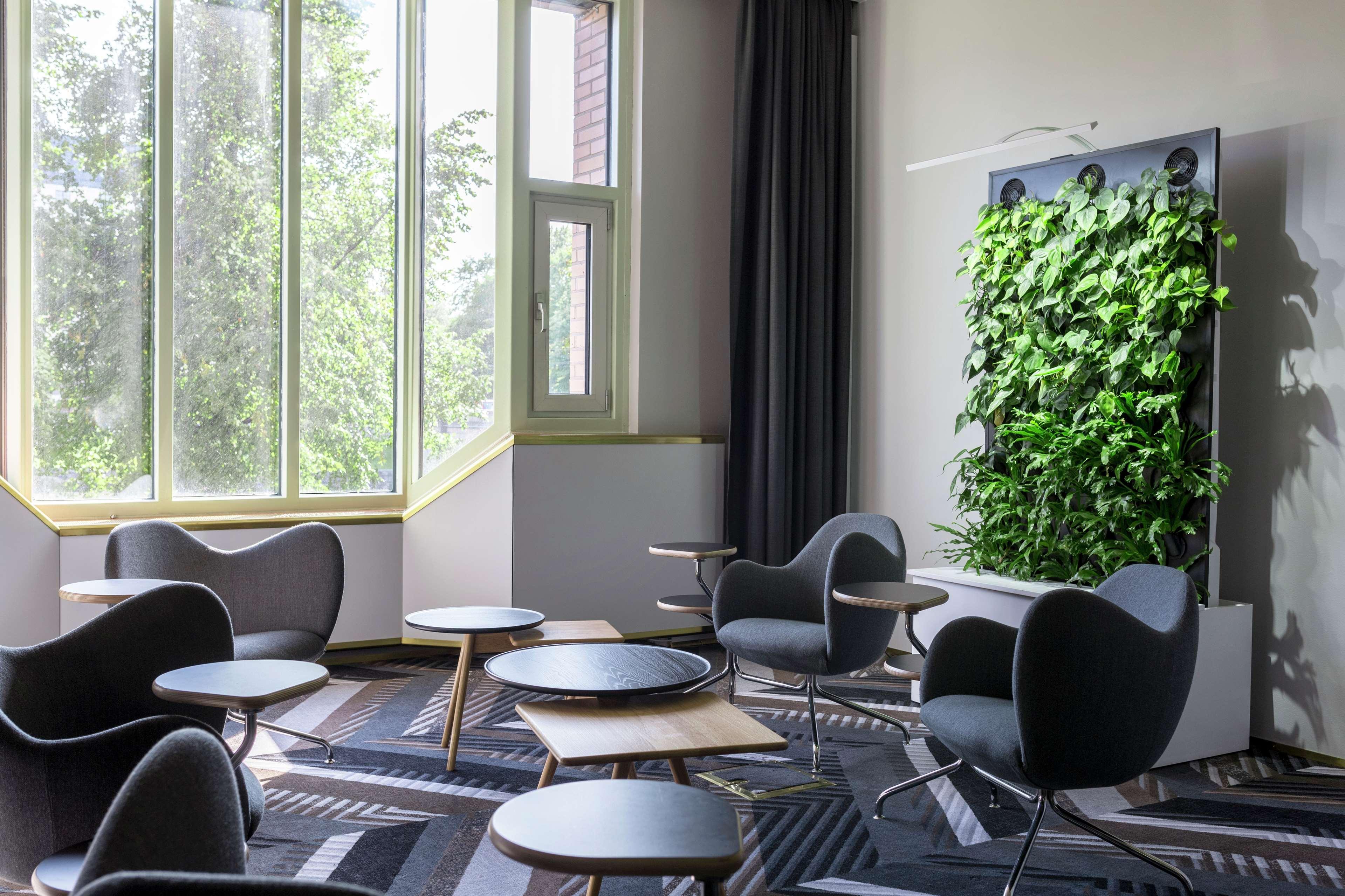 Hilton Helsinki Strand Exterior photo Green wall in a hotel